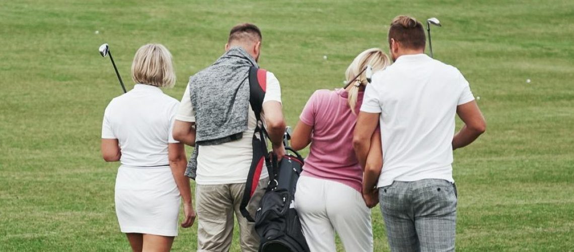 group-of-stylish-friends-on-the-golf-course-learn-to-play-a-new-game-e1615880378396.jpg